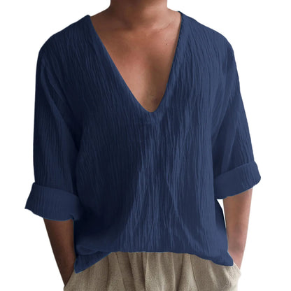 Men's washed cotton long sleeve V-neck t-shirt in a solid colour on a hanger.