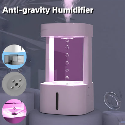 Creative anti-gravity water drop humidifier with upward flowing droplets and coloured lights