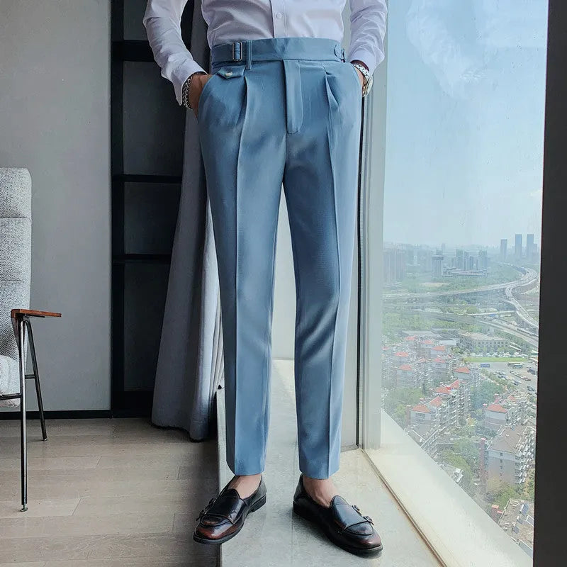 Straight-leg casual trousers in solid khaki colour on a hanger, showing the classic fit.