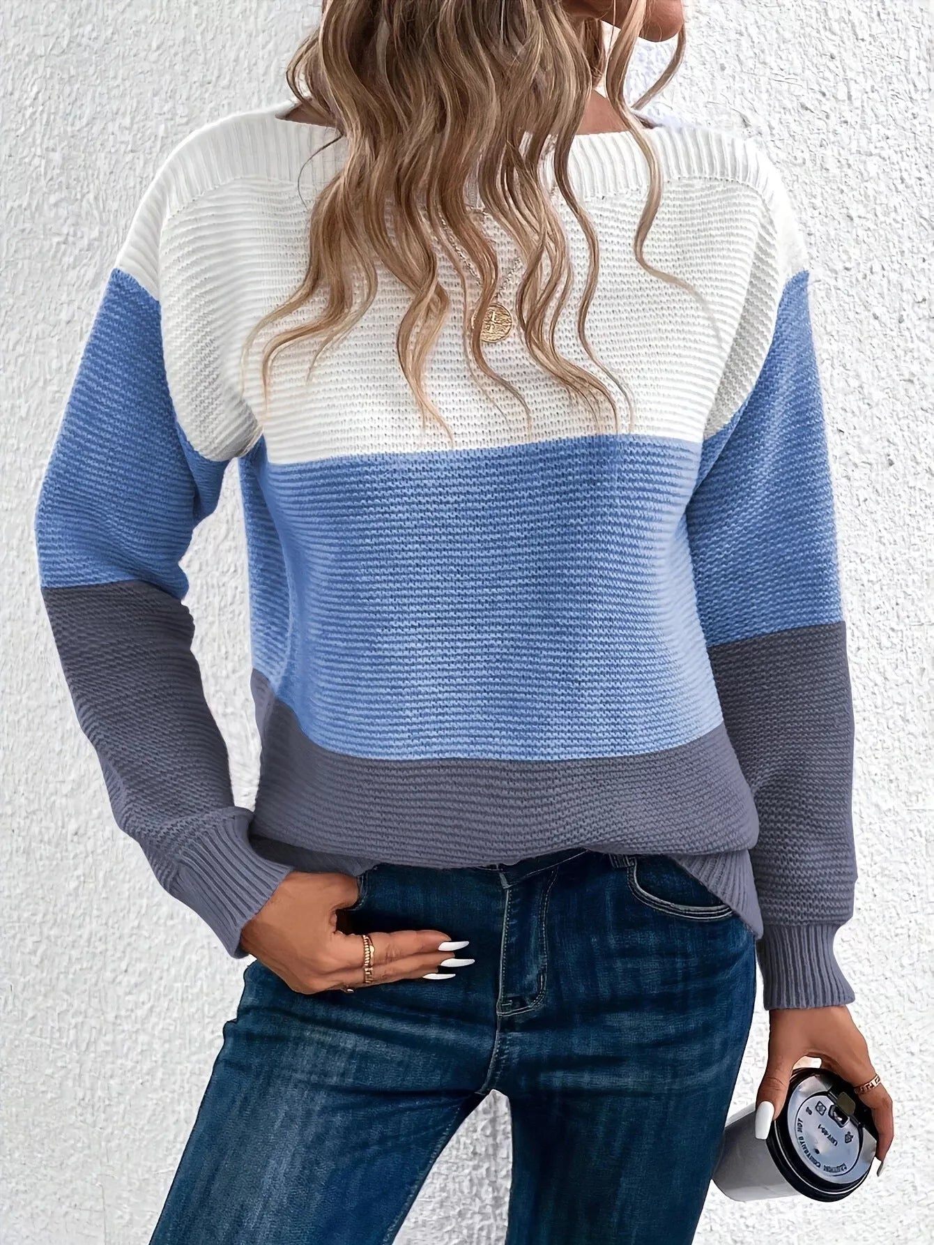 Women's round neck pullover sweater with unique splicing design in various colors
