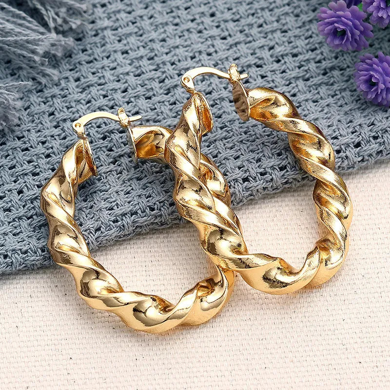 Geometric drop-shaped ear clip earrings with electroplated finish in various colours
