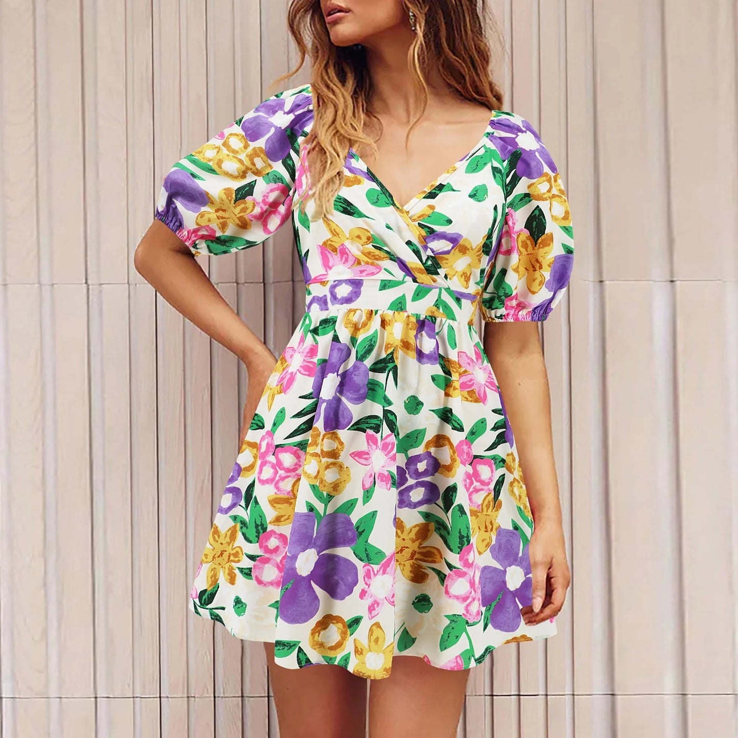 Floral lantern sleeve dress in various vibrant colors, perfect for summer vacations and beach activities
