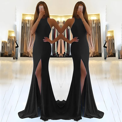 Red long evening dress with hollow detailing, high waist, and large swing skirt made from knitting fabric.