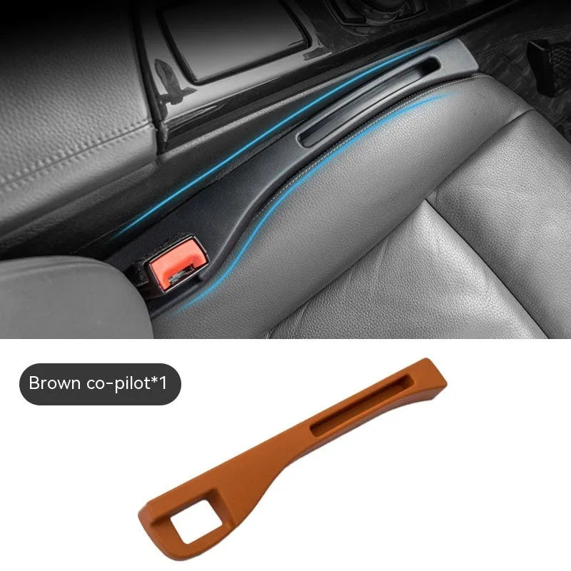 Black car seat gap storage box organiser pocket placed between vehicle seat and centre console