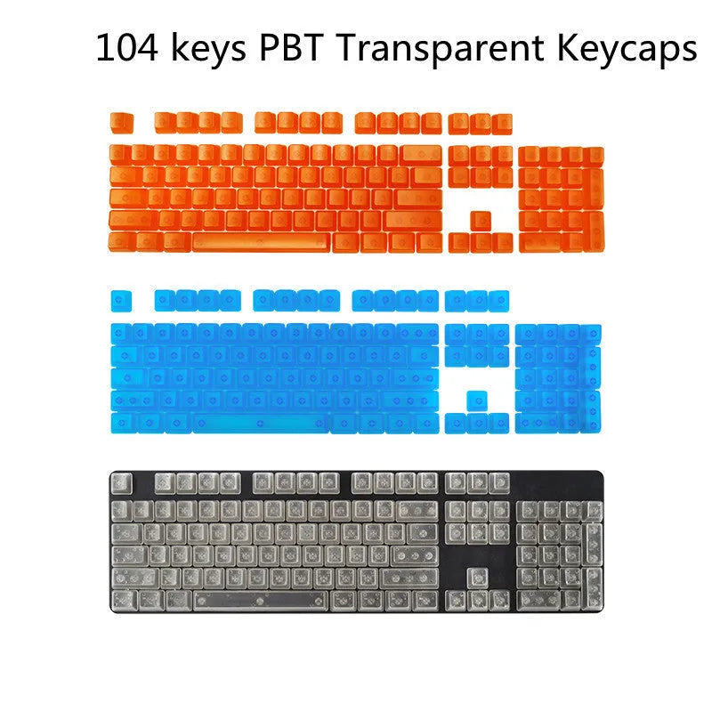Set of 104 transparent blank PBT keycaps for mechanical keyboards in orange, white, blue, and black colours.