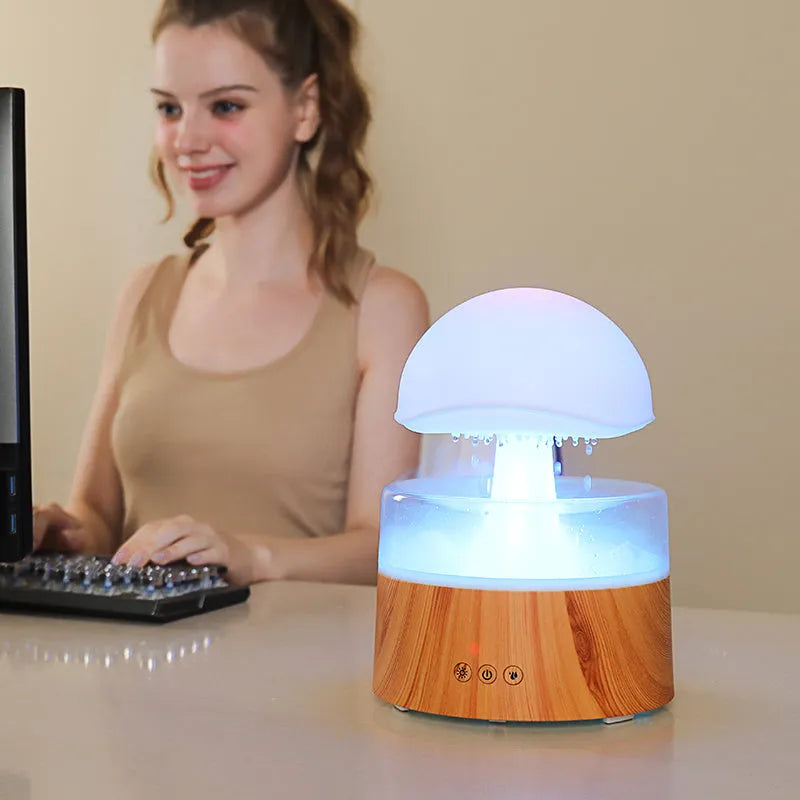 Rain cloud humidifier aromatherapy machine ultrasonic air humidifier and diffuser with 7 colour LED night light and remote control, 500ml water capacity white or wood grain finish plastic construction for bedroom relaxation and sleep aid
