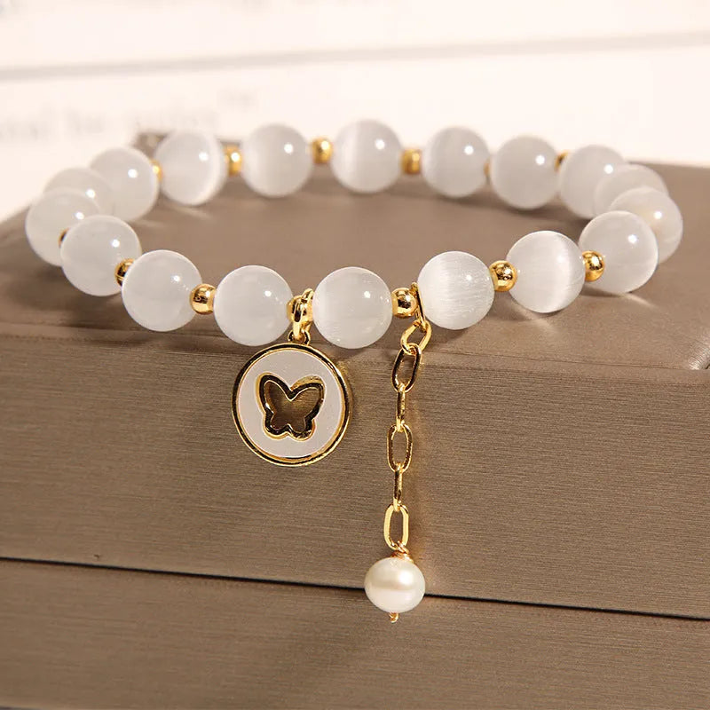 Handmade white cat's eye crystal geometric bracelet for women.