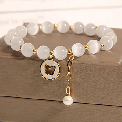 Handmade white cat's eye crystal geometric bracelet for women.