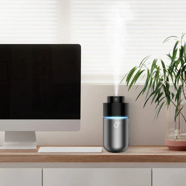 Compact and portable car humidifier with sleek design and efficient mist output to purify and moisturize the air in your vehicle