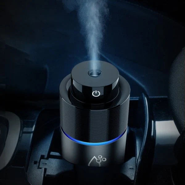Compact and portable car humidifier with sleek design and efficient mist output to purify and moisturize the air in your vehicle