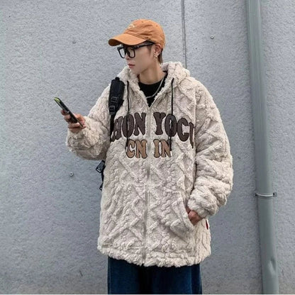 A cozy and stylish American retro-inspired lamb wool padded coat in apricot color, featuring a loose fit and long sleeves