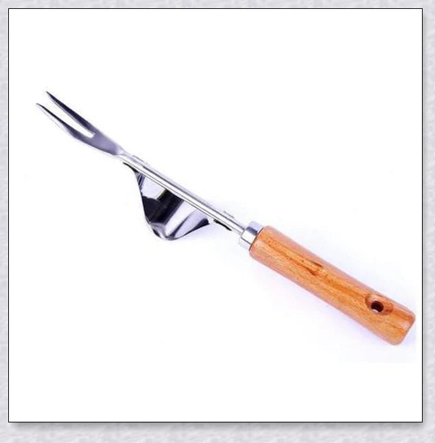 Stainless steel manual weed puller with curved lever base and sharp forked tips for efficient weed removal