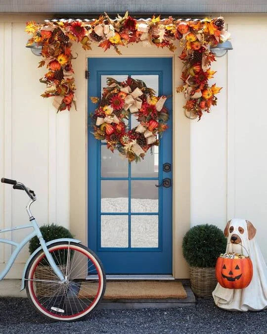 A ghostly dog figure carrying a large pumpkin candy bowl, an eerie and whimsical Halloween decoration for your home