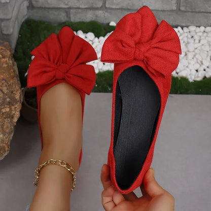 Women's big bow flat shoes with pointed toe and low heels, in black color