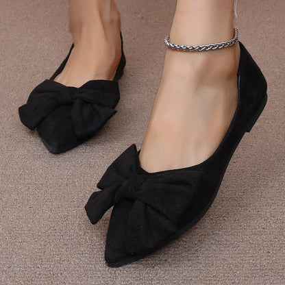 Women's big bow flat shoes with pointed toe and low heels, in black color