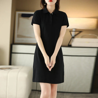 A mid-length dress with a classic polo collar, available in a variety of colors for a versatile and stylish look.