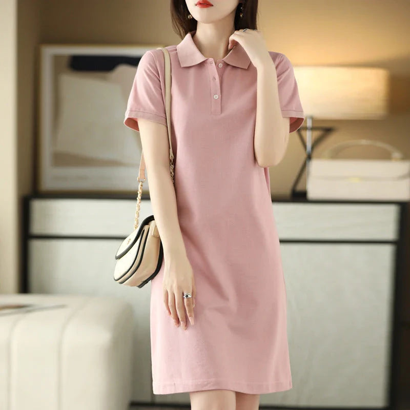 A mid-length dress with a classic polo collar, available in a variety of colors for a versatile and stylish look.