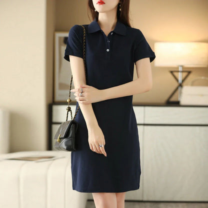 A mid-length dress with a classic polo collar, available in a variety of colors for a versatile and stylish look.