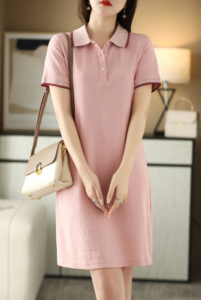 A mid-length dress with a classic polo collar, available in a variety of colors for a versatile and stylish look.
