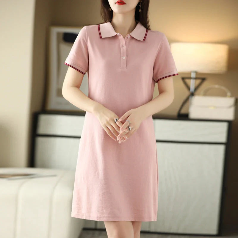 A mid-length dress with a classic polo collar, available in a variety of colors for a versatile and stylish look.