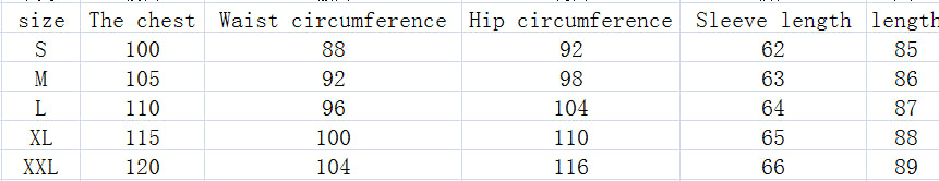 A green dress with long sleeves, featuring an A-line silhouette and a round neckline, perfect for autumn and winter seasons.