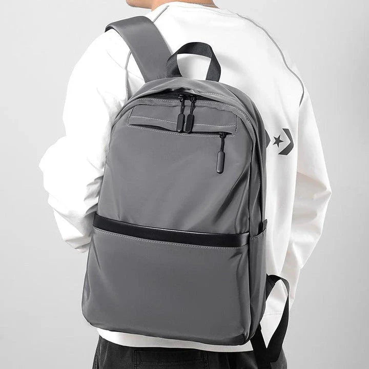 A durable, stylish travel backpack with ample storage space and comfortable padded straps