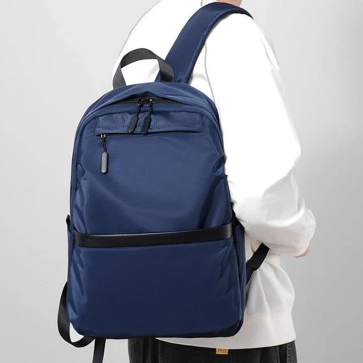 A durable, stylish travel backpack with ample storage space and comfortable padded straps