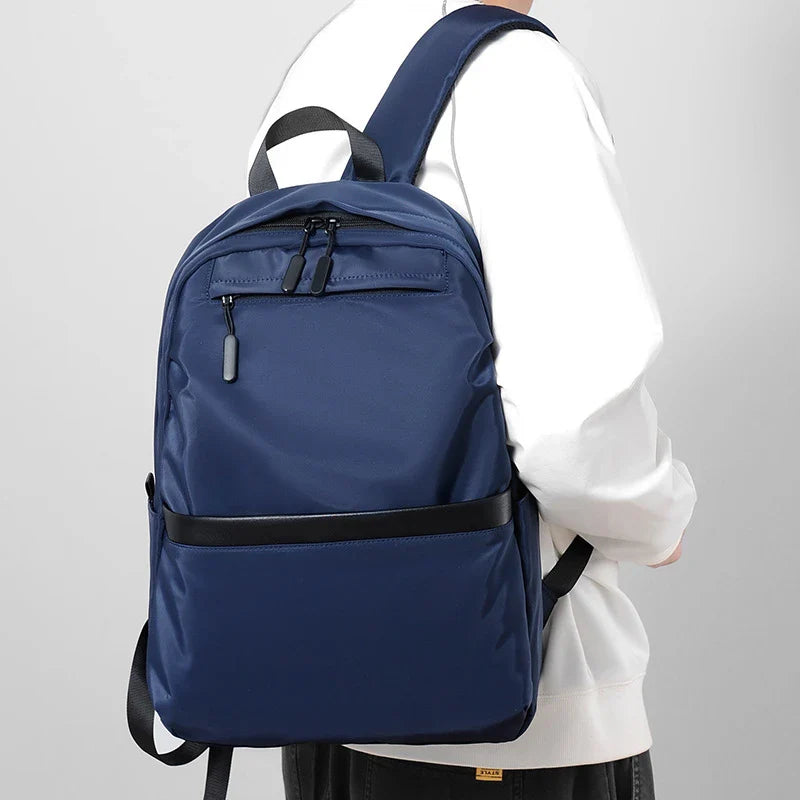 A durable, stylish travel backpack with ample storage space and comfortable padded straps