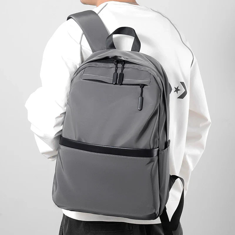 A durable, stylish travel backpack with ample storage space and comfortable padded straps