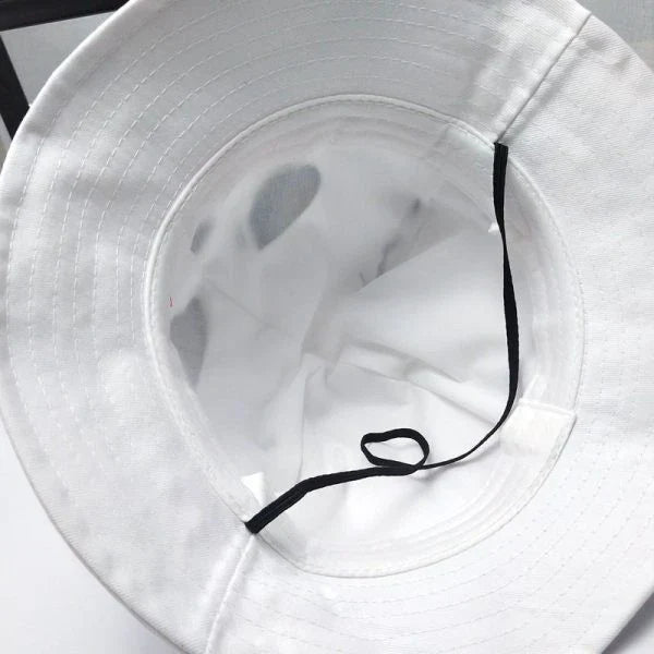 A cotton fisherman-style hat with a removable design and a cute cartoon pattern, providing rain and sun protection for babies aged 1-3 years.