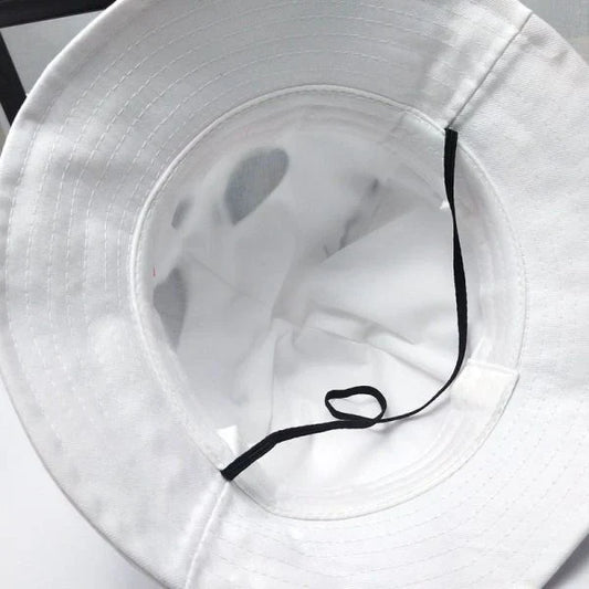 A cotton fisherman-style hat with a removable design and a cute cartoon pattern, providing rain and sun protection for babies aged 1-3 years.