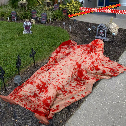 Haunting Halloween horror decor with voice-activated corpse, blood cloth, and glowing hair props