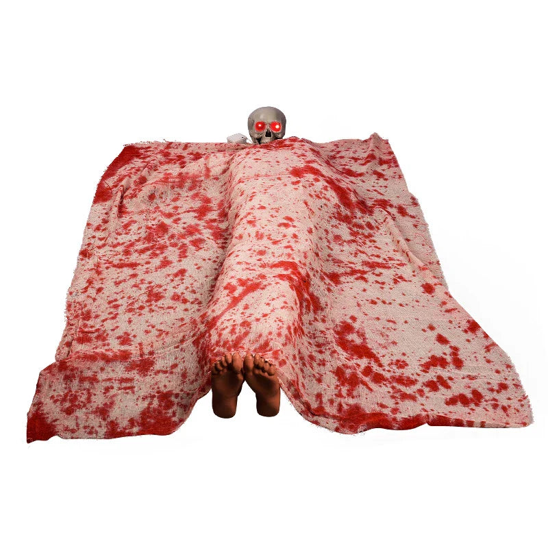 Haunting Halloween horror decor with voice-activated corpse, blood cloth, and glowing hair props