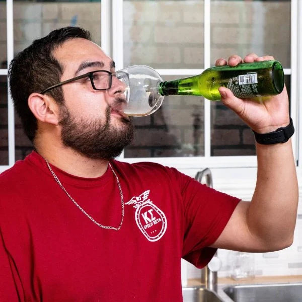 The Wine Glass Topper, a unique and elegant accessory that transforms any wine bottle into a personal wine glass, allowing for gentle aeration and enhanced flavor.