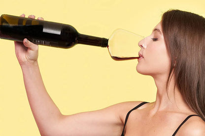 The Wine Glass Topper, a unique and elegant accessory that transforms any wine bottle into a personal wine glass, allowing for gentle aeration and enhanced flavor.