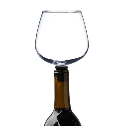 The Wine Glass Topper, a unique and elegant accessory that transforms any wine bottle into a personal wine glass, allowing for gentle aeration and enhanced flavor.