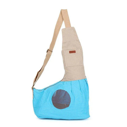 Breathable canvas crossbody carrier for dogs, puppies, and cats in green color