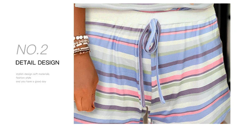 Casual women's suit with colorful striped pattern, featuring European and American-inspired design for comfortable, versatile style.