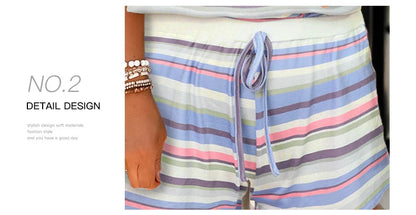 Casual women's suit with colorful striped pattern, featuring European and American-inspired design for comfortable, versatile style.