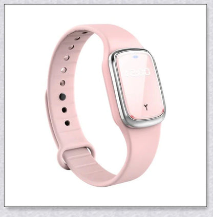 Ultrasonic mosquito repellent bracelet in black, white, and pink colors with a sleek, modern design