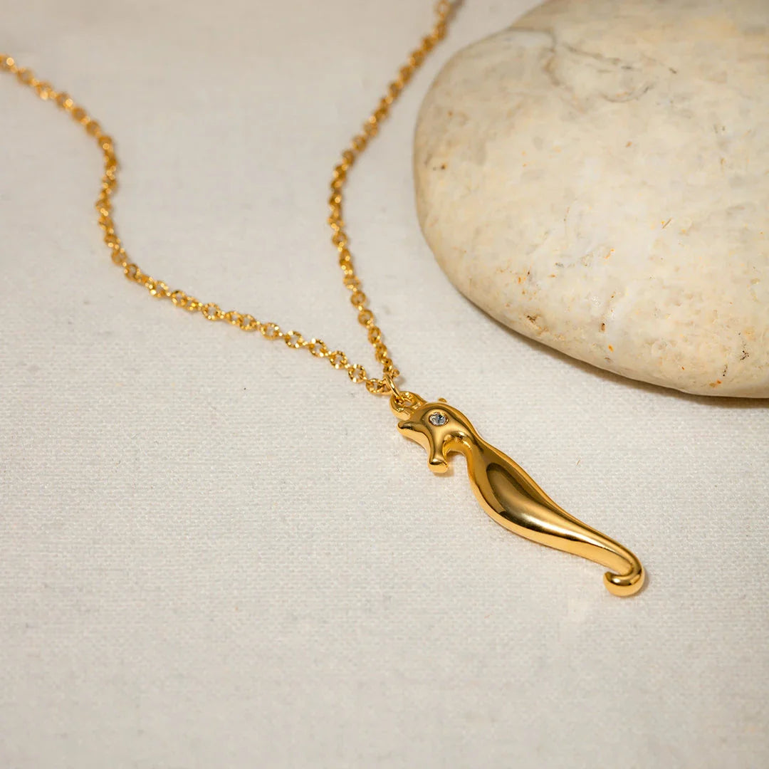 18K gold plated stainless steel pendant necklace featuring a charming seahorse design with sparkling rhinestones