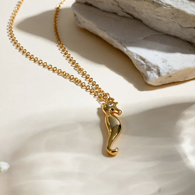 18K gold plated stainless steel pendant necklace featuring a charming seahorse design with sparkling rhinestones