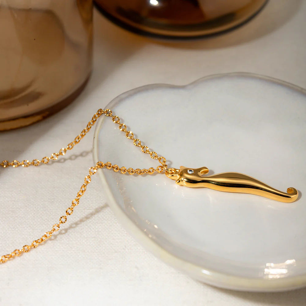 18K gold plated stainless steel pendant necklace featuring a charming seahorse design with sparkling rhinestones