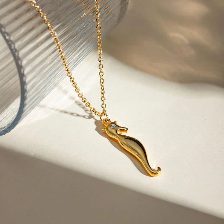 18K gold plated stainless steel pendant necklace featuring a charming seahorse design with sparkling rhinestones