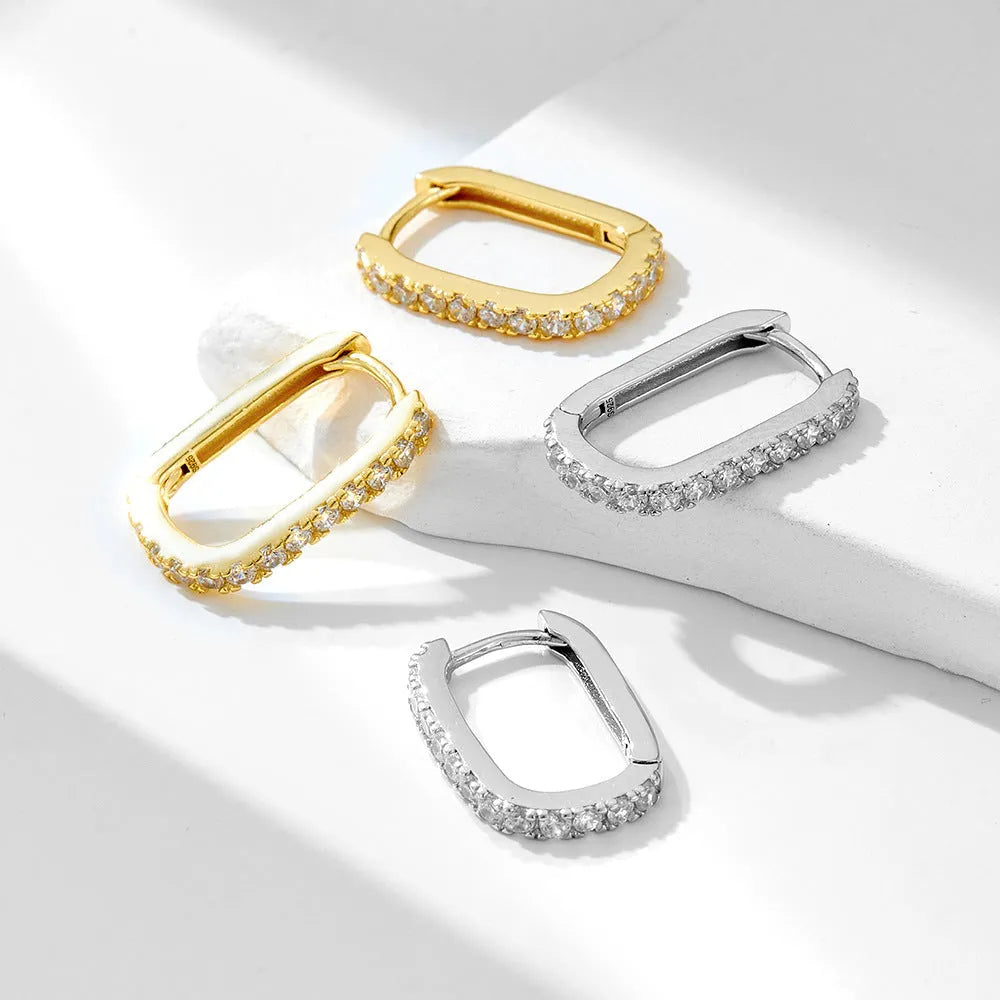 S925 sterling silver oval zircon earrings with geometric design and ear clip back