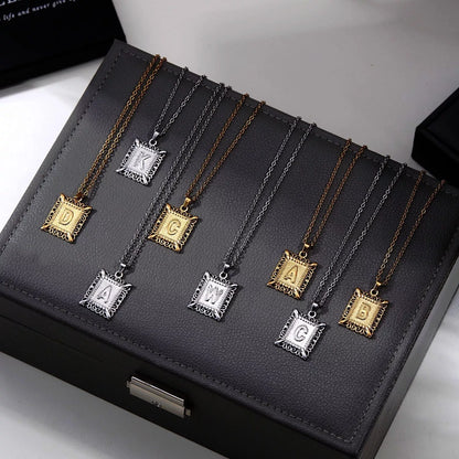 Personalized initial letter necklace in gold or steel, featuring any letter from A to Z