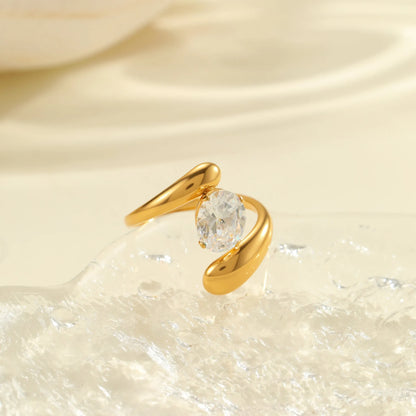Geometric zircon ring showing round, oval and quadrangular design elements in stainless steel with electroplated finish
