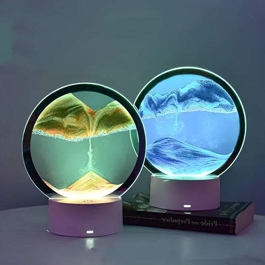 3D quicksand table lamp with glass shade showing colour-changing light on a bedside table