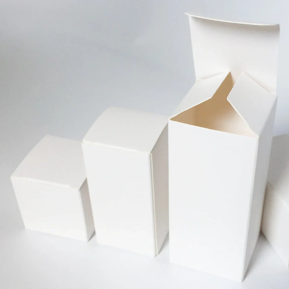 White paper storage boxes showing size variations from 3x3cm to 10x10cm base with different height options