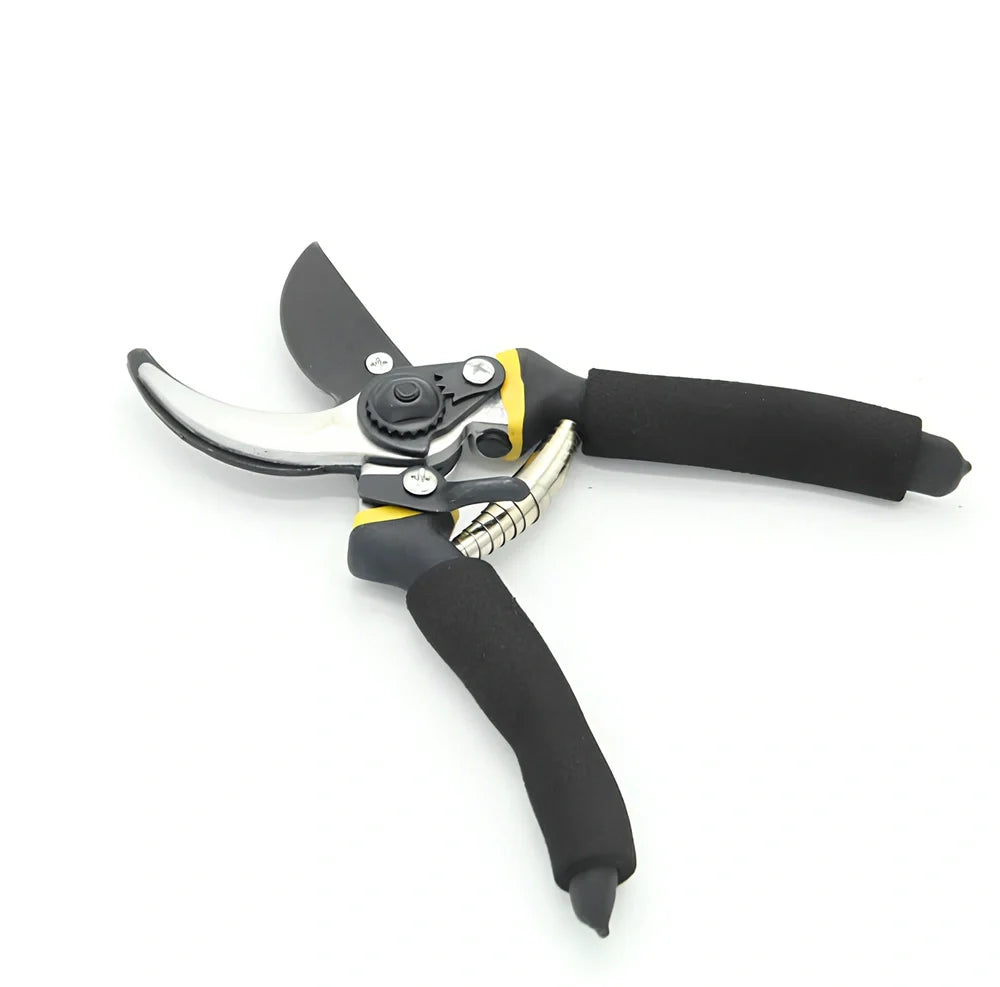 Yellow and green garden shears with 50# steel blades cutting 30mm branches